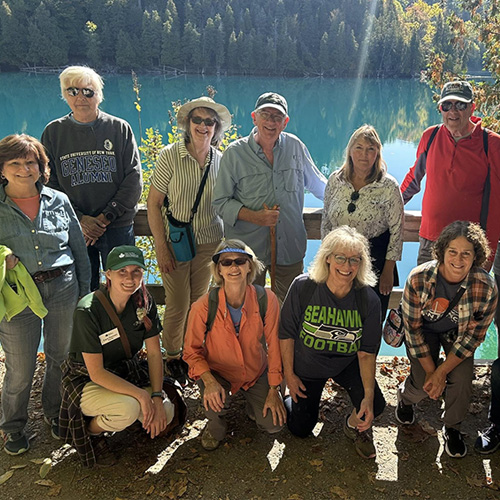 Upstate participants in front of green lake